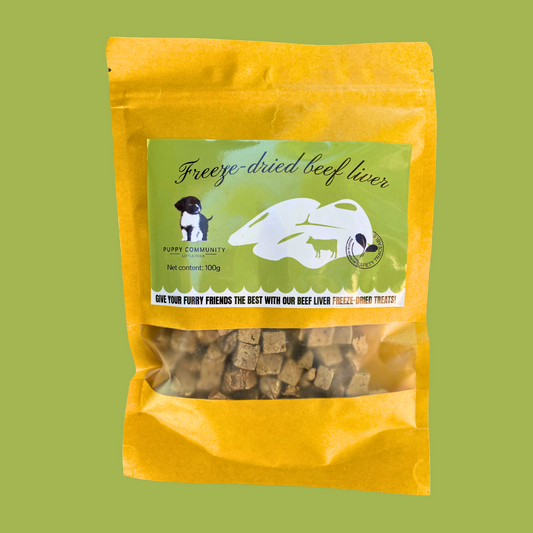 green background with kraft resealable bag. bag contains small squares of freeze dried beef liver.