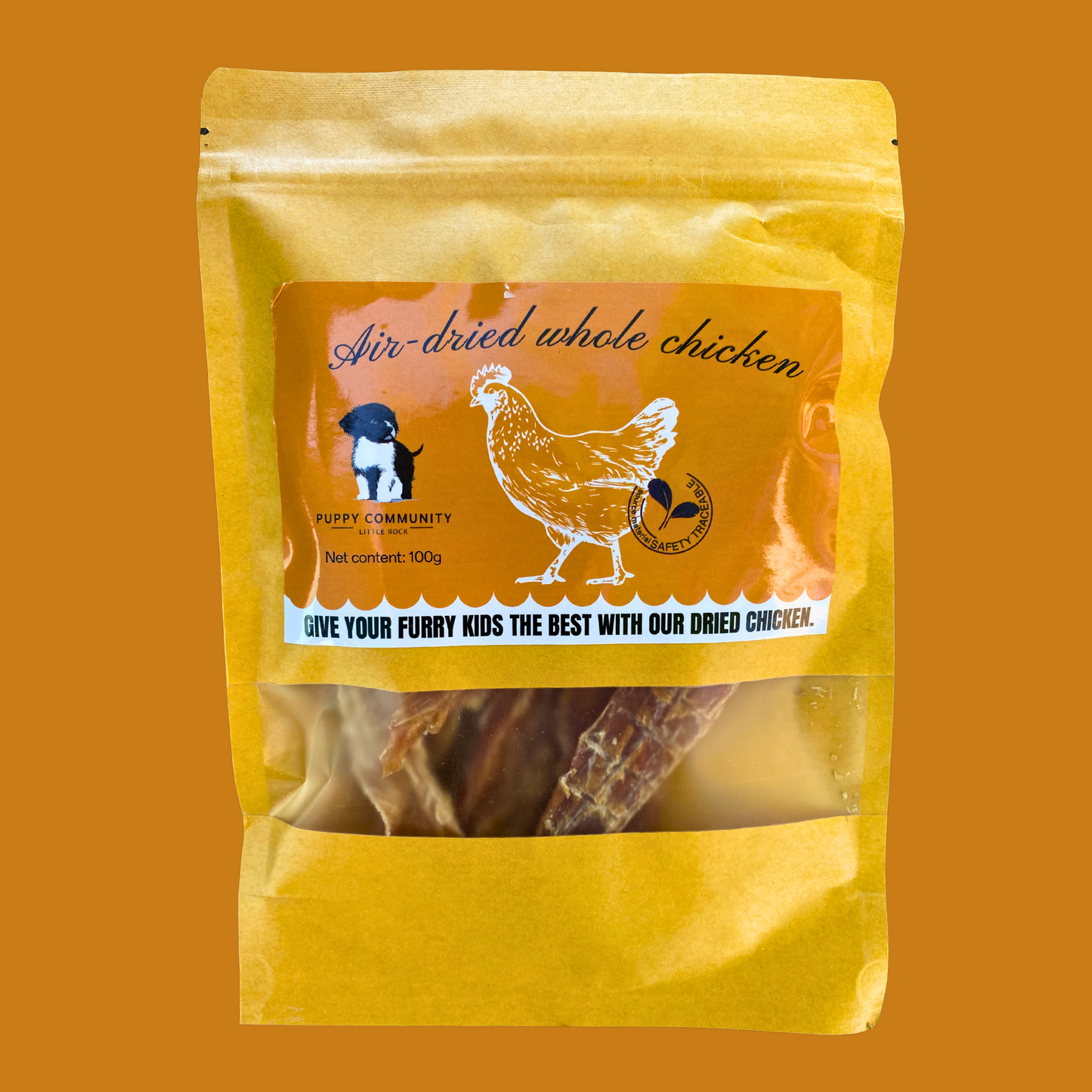 kraft bag filled with chicken jerky with orange label. the label shows the puppy community logo and a graphic chicken