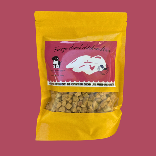 fuchsia background with kraft resealable bag. bag contains small squares of freeze dried chicken liver.