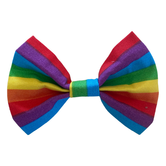 bright rainbow bow tie for dogs. two white velcro strips attach to collar.